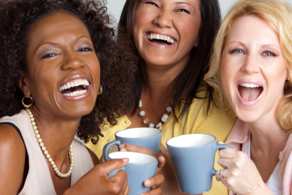 Three women enjoy coffee together